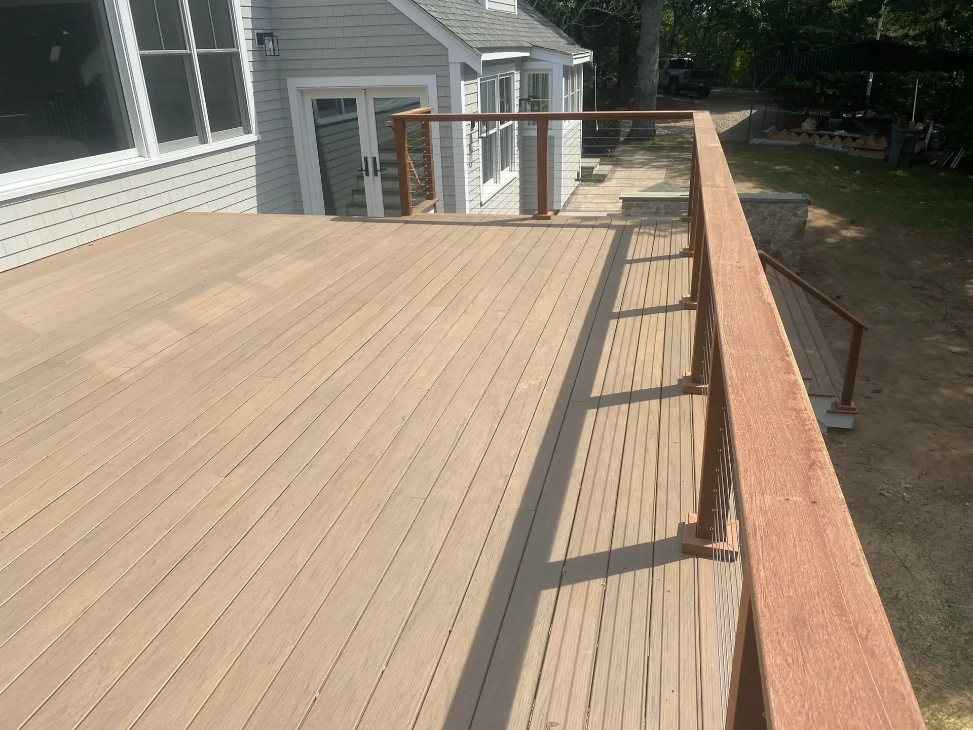 Newly built composite deck overlooking the backyard